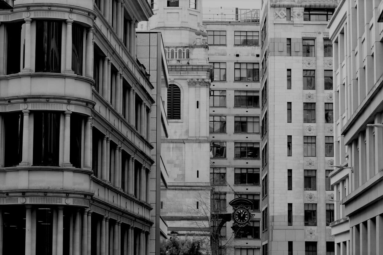 March 2020 / London UK : White stone Corporate buildings in the financial district of London